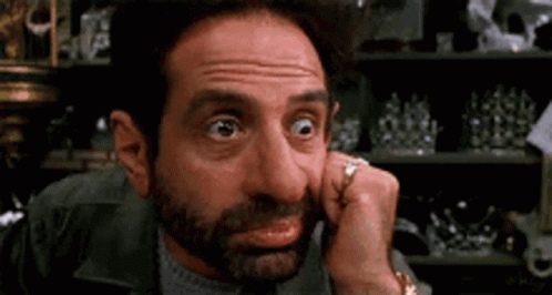 Extrait de Men in Black où Jones et Smith regardent le pretteur sur gage juste avant de lui exploser la tête.